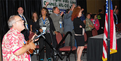 WSLC Vice President Vance Lelli plays "Solidarity Forever."