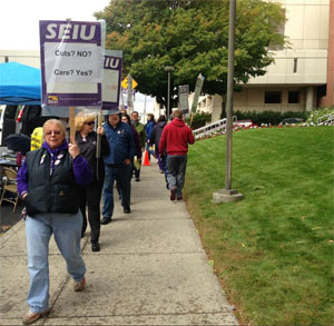 SEIU HealthCare 1199NW conduct an information picket outside Deaconess Hospital in October.