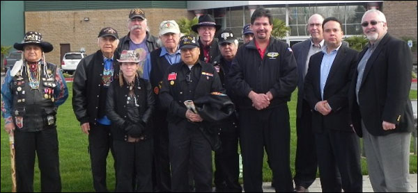 At a gathering of the Inter Tribal Warriors Society in Washington state, General Vice President Gary Allen, second from right, presented a donation to the Council for First Inhabitants Rights and Equality (Council FIRE), an advocacy group for Native American issues founded by Western Territory Grand Lodge Representative Kevin Cummings, right.