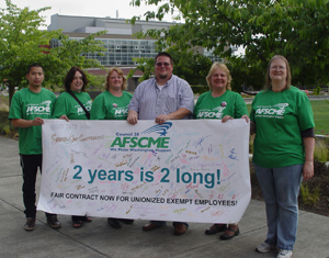 From left: WFSE/AFSCME’s Kent Tse and Vanessa Arpin, TCC Exempt Staff Bargaining Team member Kari Twogood, Adam Hoyt of Jobs with Justice, and WFSE/AFSCME’s Rosemary Sterling and Amy Murphy.