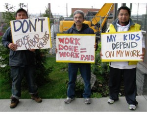 (From left) Armando Arredondo, Hector Martinez and Noe Montes of the Workers defense Committee at Casa Latina.