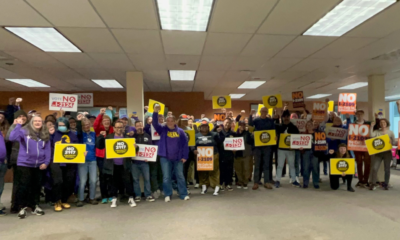 Labor Neighbor volunteers pose for a photo before hitting the doors to get out the 'NO' vote on anti-worker initiatives.
