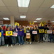 Labor Neighbor volunteers pose for a photo before hitting the doors to get out the 'NO' vote on anti-worker initiatives.