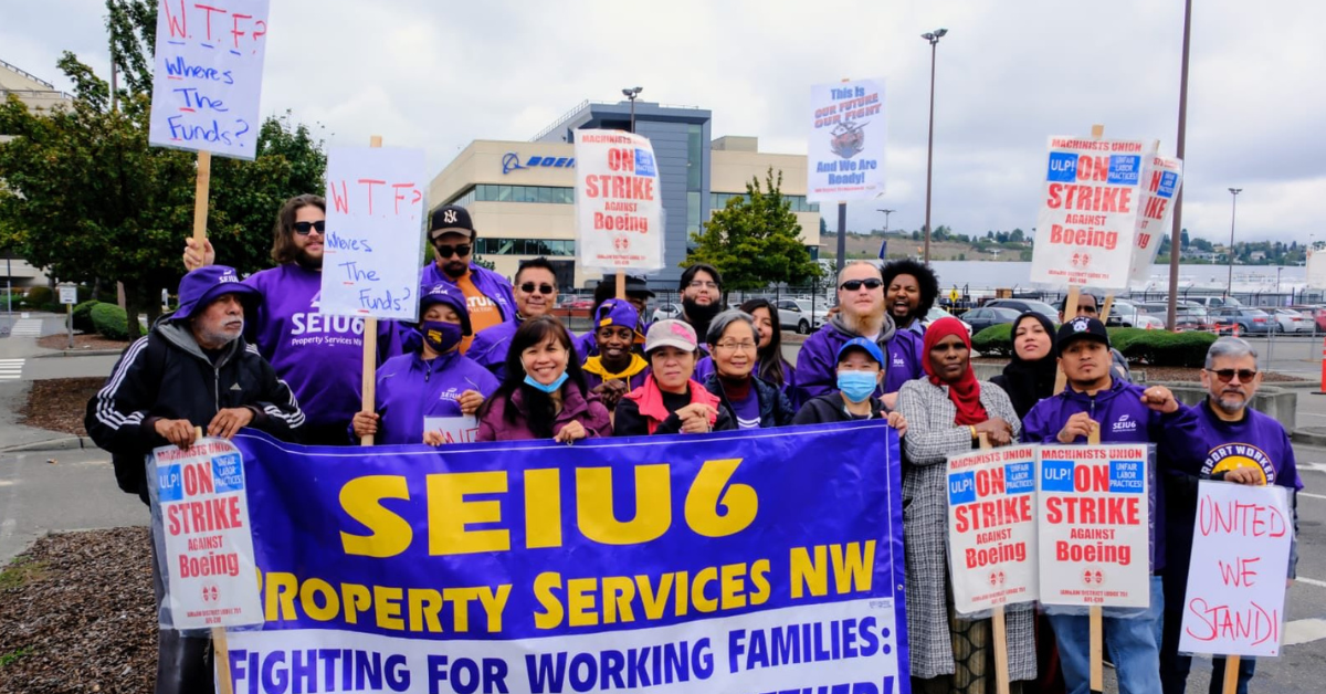 SEIU 6 members pose for a photo with striking Machinists. Union members from across industries backed up the Machinists' on their strike lines. Photo: SEIU 6